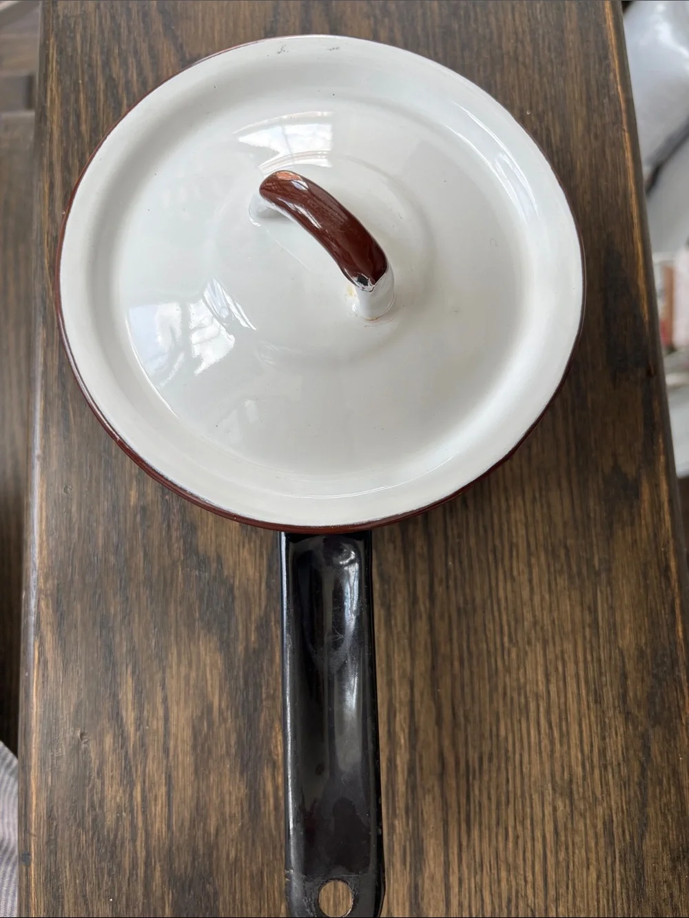 Vintage enamelware small sauce pan w/lid, dark brown /white, 11.5” long, 3” tall